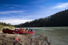 Canoes along river