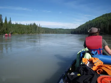 paddling a loaded canoe