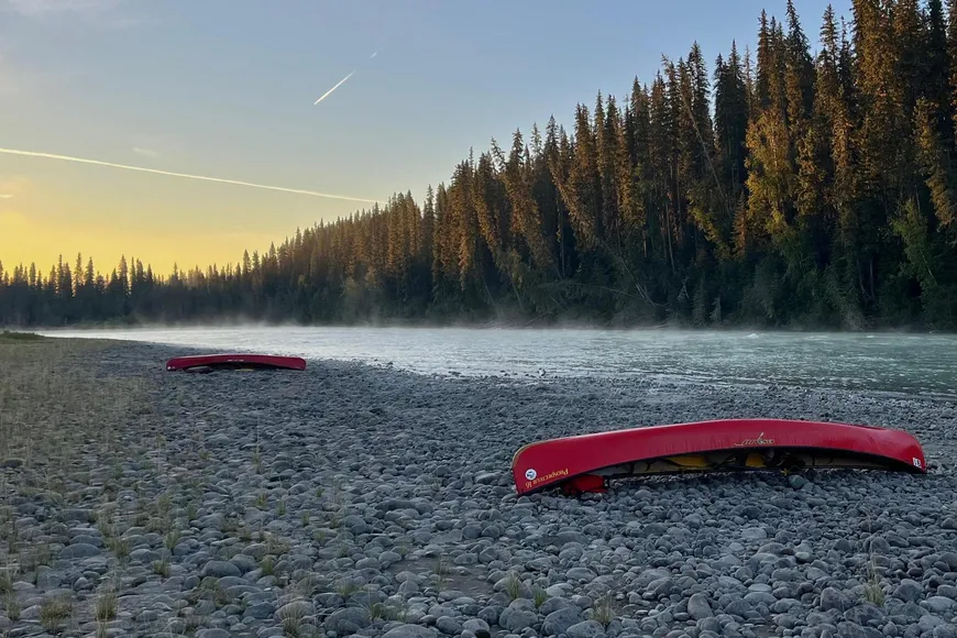 Canoes on foggy morning