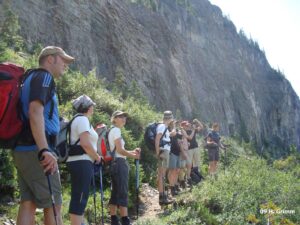 Canadian Rockies adventure tours, group of hikers on mountain trail