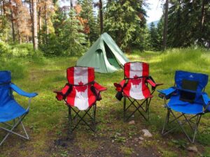 camping tours in Canada, campground with tent in the forest